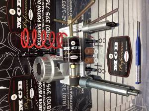 Ski Doo QRS XRS secondary rollers with optional service tools, Drift pin removal Punch, QRS XP Helex compression Removal Tool complete service kit.